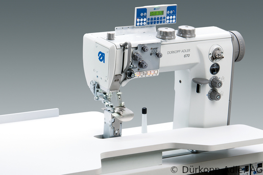 670- Dürkopp Adler 1-Needle lockstitch post bed bottom feed, needle feed and alternating foot top feed sewing unit (0670 990001 017)