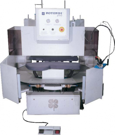 Rotondi 18RD P-17 180 degree rotation carousel for dart and side seam opening and pocket welt pressing. Equipped with Leonardo computer